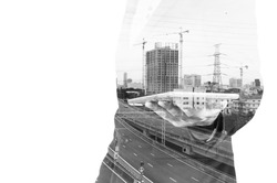 Double exposure of Businessman with Tablet and Modern City Building isolate on white as Business Technology Concept