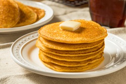 Homemade Corn Meal Johnny Cakes with Butter and Syrup