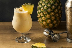 Boozy PIneapple Painkiller Cocktail with Coconut Cream and Nutmeg