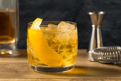 Boozy Refreshing Rusty Nail Cocktail with Lemon Garnish