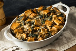 Homemade Savory Bread Pudding with Eggs Cheese and Kale