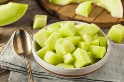 Green Organic Honeydew Melon Cut in a Bowl