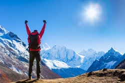 Victorious man Enjoying the Success in Himalayas Mountains, Nepal