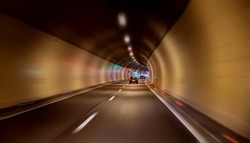 Car rides through the tunnel point-of-view driving
