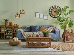 Green wall interior room concept with blue sofa, wooden middle table ornament frame and lamp style.