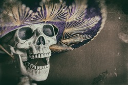 Mexican Bandit Skeleton 1. A skeleton wearing a Mexican sombrero. Edited in a vintage film style.