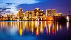 West Palm Beach, Florida skyline and city lights as night falls
