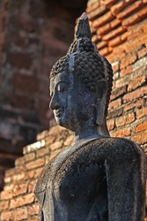 Buddha statue in a sitting position in Sukhothai