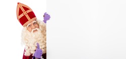 Sinterklaas or saint Nicholas holding blank cardboard. isolated on white background. Dutch character of Santa Claus