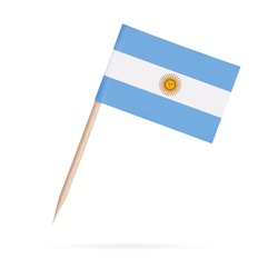 Miniature paper flag Argentina. Isolated Argentinian toothpick flag stick on white background. With shadow below.