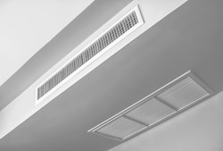 air conditioning vent on white ceiling