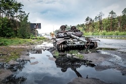Wreck of burned russian tank in Ukraine. Russian aggression in Ukraine 2022