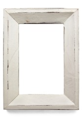 Distressed white painted picture frame, isolated on white.