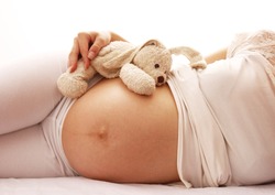 a pregnant woman on a white background 