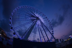 Ferris wheel on sunset in Bangkok, Thailand