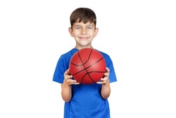 Young boy on white background with baby basketball, loves sports, playing basketball and other games with dad, isolated, sport concept