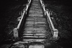 Black and white image of an old church staircase