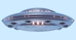 Unidentified flying object on light blue neutral background. Image with clipping path included. 