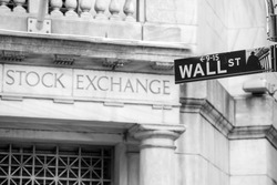 Wall street sign in New York City in black and white