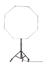 Flash light with octagonal octagon softbox on stand with wheels. Studio lighting equipment isolated on white background.