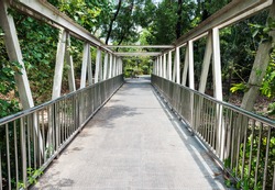 Old steel bridge to connect between urban park.