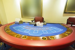 Interior of a casino with blackjack table 