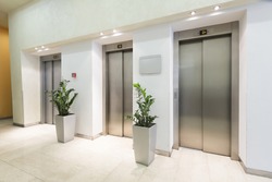 Three elevators in hotel lobby