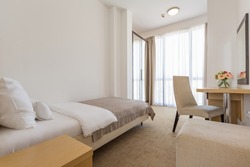 Interior of a single bed  hotel bedroom