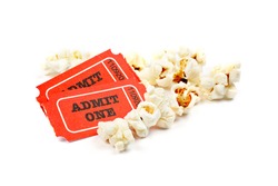 Popcorn and two tickets on white background with soft shadow. Shallow DOF