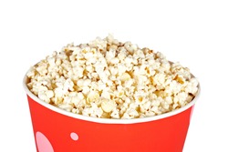 Detail of popcorn in a bucket over a white background