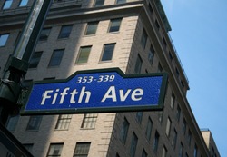 FIfth Avenue Street SIgn in New York City, a popular venue for stores, shops and entertainment in Manhattan, conceptually can represent success, commercialism, retail