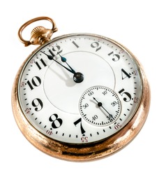 Antique golden pocket watch showing a few minutes to midnight isolated on white background. Concept of time,the past or deadline.