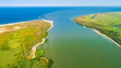 Aerial view of the place where Danube River merges with Black Sea in Romania