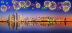 The beauty panorama of skyscrapers in Dubai Marina with fireworks. UAE