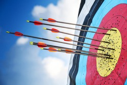 Successful concept, all gold arrows on target, archery sport.
