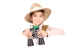 Young boy with binoculars playing Safari isolated over a blank board