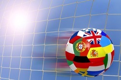 Euro cup soccer ball with flags over a goal's net