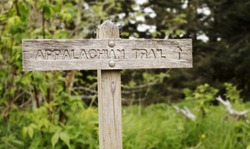A wooden marker directing hikers along the Appalachian Trail on the Great Smoky Mountains.
