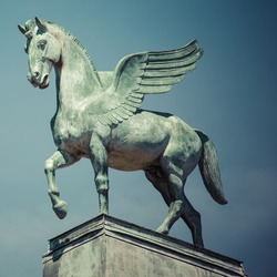statue of pegasus on the roof of opera in poznan poland