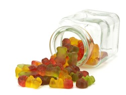 Gummy bears, candies in jar on a white background     