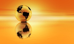 Planet earth reflected in an orange sea with an orange atmosphere