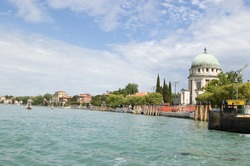 Approaching the water bus, or vaparetto, stop for the Lido island of Venice, Italy.