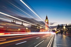 Light trails on the Westminster bridge after sunset. Big Ben and House of Parliament in London, The United Kingdom of Great Britain and Northern Ireland