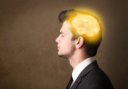 Young man thinking with glowing brain illustration