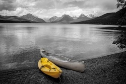 Canoe and Kayak  at lake McDonald shore line in glacier national park, Montana