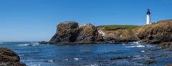 Panoramic view of Yaquina Head Lighthouse, view from Cobble beach.