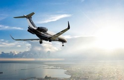 Private jet flying over Limassol city, Cyprus