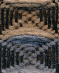 Closeup of threedimensional waffle weave pattern in orange and grey