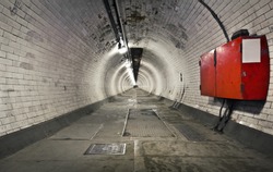 A long foot tunnel under the river Thames to Canary Wharf from Greenwich, London