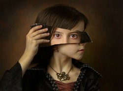 Surrealistic image of girl with mirror.